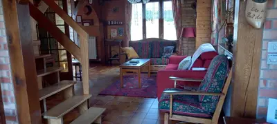 Coin salon dans l'établissement Gîte du bel air