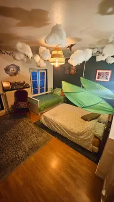 Un ou plusieurs lits dans un hébergement de l'établissement Jurassic Lodge, le repaire des dinosaures