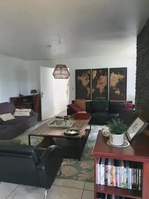 Coin salon dans l'établissement Maison de charme à la campagne
