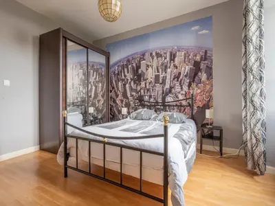Un ou plusieurs lits dans un hébergement de l'établissement Vintage Holiday Home in Nouart