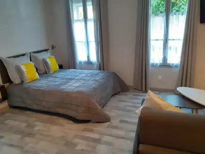 Un ou plusieurs lits dans un hébergement de l'établissement Les appartements du Saint Hubert