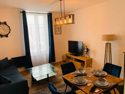 Télévision ou salle de divertissement dans l'établissement Nice cocooning apartment for a relaxing moment