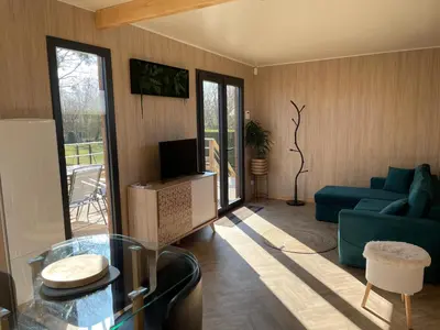 Télévision ou salle de divertissement dans l'établissement Au fil de l’eau, gîte nature
