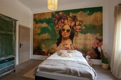 Un ou plusieurs lits dans un hébergement de l'établissement Loft Détente Fun Champagne Experience