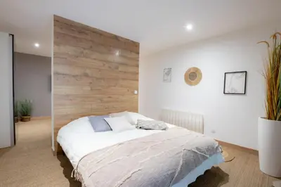 Un ou plusieurs lits dans un hébergement de l'établissement Loft Détente Fun Champagne Experience