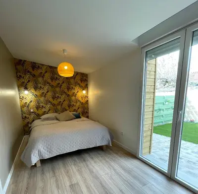 Un ou plusieurs lits dans un hébergement de l'établissement la casa verde 2 chambres 2 salles de bain 2 wc jardin