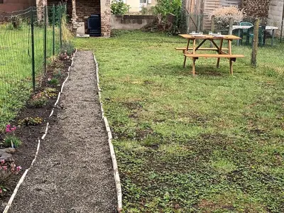 Jardin de l'établissement Gite La Revinoise