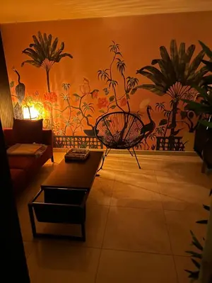 Coin salon dans l'établissement Pink Tropical Champagne