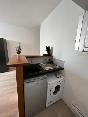 Cuisine ou kitchenette dans l'établissement Reims voyage