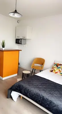 Un ou plusieurs lits dans un hébergement de l'établissement Reims voyage