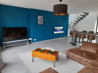 Coin salon dans l'établissement Appartement moderne et spacieux