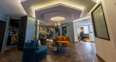 Coin salon dans l'établissement Best Western Plus Le Picardy