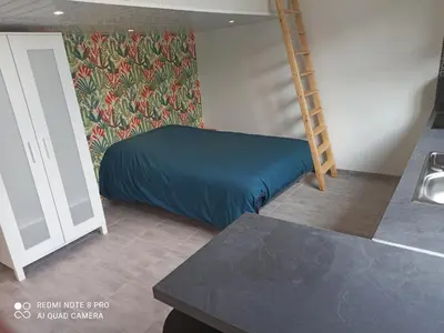 Un ou plusieurs lits dans un hébergement de l'établissement Maisonnette indépendante 4 personnes jardin terrasse