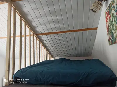 Un ou plusieurs lits dans un hébergement de l'établissement Maisonnette indépendante 4 personnes jardin terrasse