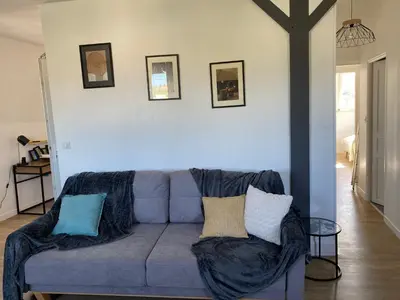 Coin salon dans l'établissement L’ÉLÉGANT: 80m2 vue sur vignoble au Centre d’Epernay!!