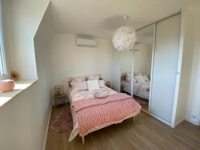 Un ou plusieurs lits dans un hébergement de l'établissement L’ÉLÉGANT: 80m2 vue sur vignoble au Centre d’Epernay!!