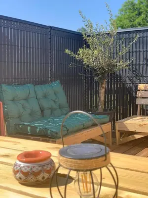 Coin salon dans l'établissement L'HACIENDA CHAMPENOISE