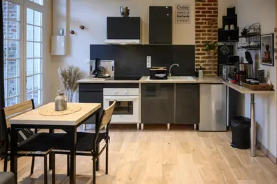 Cuisine ou kitchenette dans l'établissement gîte Cosy Green 2