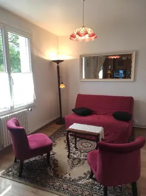 Coin salon dans l'établissement La Lisière Appartement 2 chambres