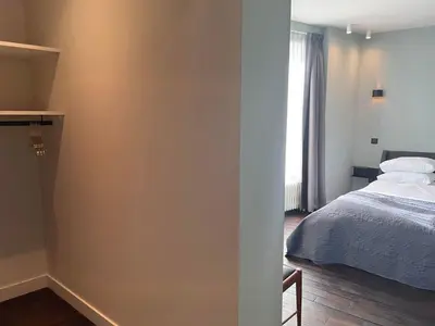 Un ou plusieurs lits dans un hébergement de l'établissement Le Petit Château