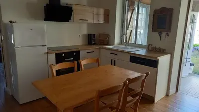Cuisine ou kitchenette dans l'établissement Le Gîte des Murmures