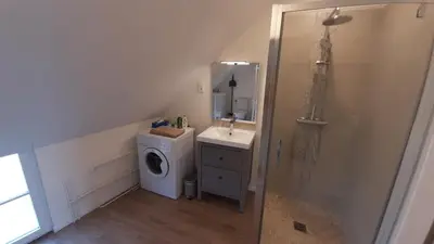 Salle de bains dans l'établissement Les petits greniers