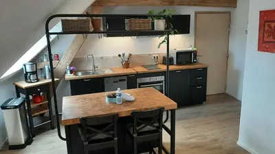 Cuisine ou kitchenette dans l'établissement Les petits greniers