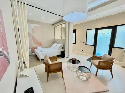 Coin salon dans l'établissement Suite Monceau - Reims