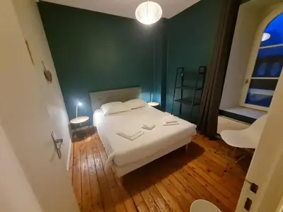 Un ou plusieurs lits dans un hébergement de l'établissement La Tour L'évêque gite 3 chambres 5 pers 5 km Soissons