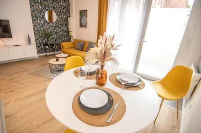 Coin salon dans l'établissement KASA SAINT QUENTIN - Tout équipé & Cosy