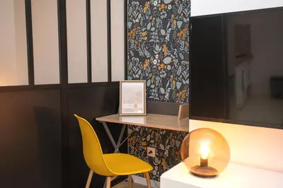 Coin salon dans l'établissement KASA SAINT QUENTIN - Tout équipé & Cosy