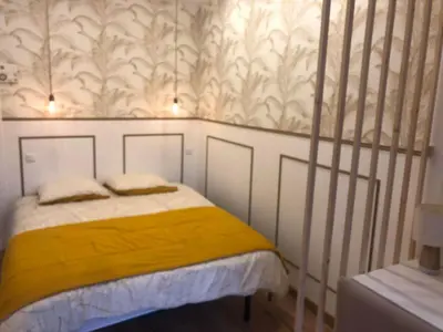 Un ou plusieurs lits dans un hébergement de l'établissement Superbe Appartement en plein centre-ville de Crépy