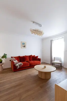 Coin salon dans l'établissement Les Appartements Porte Mars Reims Gare Centre
