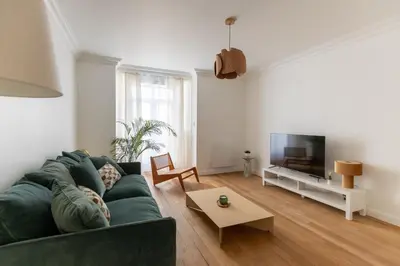 Télévision ou salle de divertissement dans l'établissement Les Appartements Porte Mars Reims Gare Centre