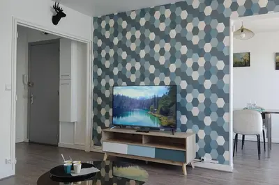 Télévision ou salle de divertissement dans l'établissement Le Thourottois*Centre ville*Wifi*Spacieux*Confort* Saint-Gobain