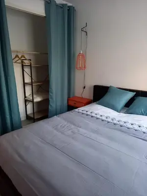 Un ou plusieurs lits dans un hébergement de l'établissement Appart plein centre, balcon - 4 personnes