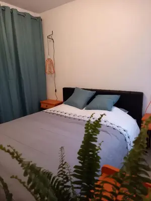 Un ou plusieurs lits dans un hébergement de l'établissement Appart plein centre, balcon - 4 personnes