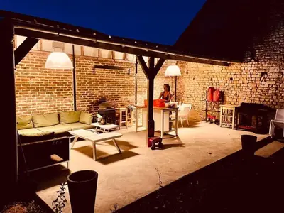 Coin salon dans l'établissement Villa Verger vakantiewoning 12 personen