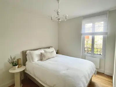 Un ou plusieurs lits dans un hébergement de l'établissement Petit Vert Appartement premium hypercentre Épernay Terrasse
