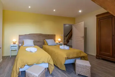 Un ou plusieurs lits dans un hébergement de l'établissement GITE ENTRE TERRES ET VIGNES à la ferme avec SPA privatif en CHAMPAGNE à une heure de Paris