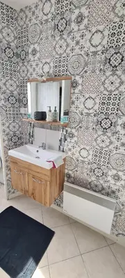 Salle de bains dans l'établissement CHALET ANTLANA maison chaleureuse