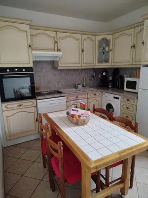 Cuisine ou kitchenette dans l'établissement Le Relais de la Bulle Enchantée