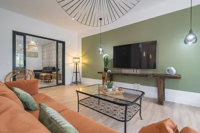 Télévision ou salle de divertissement dans l'établissement LA VILLA PALOMA