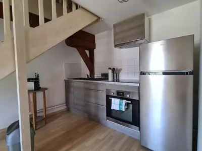 Cuisine ou kitchenette dans l'établissement Aux remparts du château