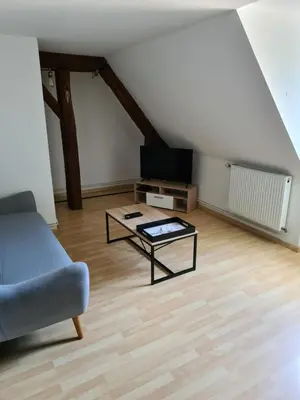Coin salon dans l'établissement Aux remparts du château