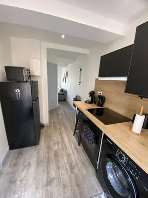 Cuisine ou kitchenette dans l'établissement L'Emile Zola
