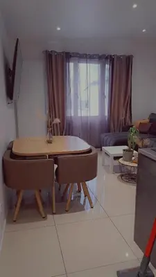 Coin salon dans l'établissement DOGA Bel appartement 1er étage 4 personnes bebe