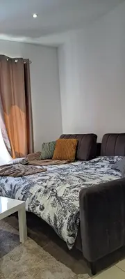 Un ou plusieurs lits dans un hébergement de l'établissement DOGA Bel appartement 1er étage 4 personnes bebe