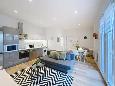 Cuisine ou kitchenette dans l'établissement Le Sacré - CENTRE - Cour privative - PARKING