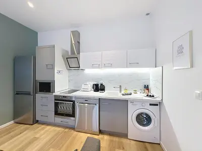 Cuisine ou kitchenette dans l'établissement Le Sacré - CENTRE - Cour privative - PARKING